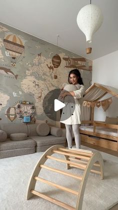 a woman standing in front of a wooden bed frame with an elephant on the floor