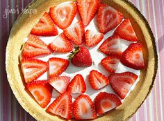 there is a pie with strawberries on it