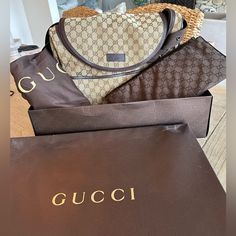 Pre Loved Gucci Canvas Diaper Bag I Have The Original Tag. It’s Authentic Gucci. Was Given To Me When My Son Was Born. Sold W Dust Bag And Box. Box Is A Bit Dented As Seen On Pictures And Diaper Bag Is Lightly Used And Can See It On Images At The Bottom. Looks In Great Condition Just Some Light Scuffs At The Bottom Of Bag. But Barely Noticeable In Person. Single Crossbody Strap Two Exterior, Side Slip Pocket Multiple Interior Slip Pockets Signature Logo Print Detail With Leather Trim Flat Bottom Gucci Diaper Bag, Changing Mat, Me When, Baby Bag, Signature Logo, Crossbody Strap, Leather Trim, My Son, Logo Print