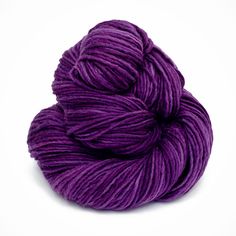 a skein of purple yarn on a white background