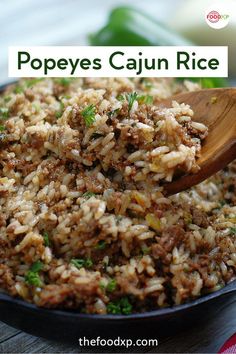 a close up of food in a pan on a table with text overlay that reads popes cajun rice