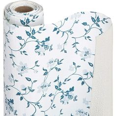 a roll of white toilet paper with blue and white floral print on the bottom half