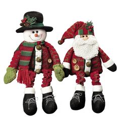 two snowmen dressed in red and green outfits