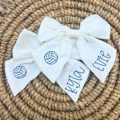 This listing is for an individual Volleyball Personalized Linen Hair Bow with Name.  Customize thread colors so you can rep for your favorite team! They are embroidered with the name and your choice of school image.  The bows measure approx. 5.5" wide. The bow is on a duckbill clip... headbands are not available at this time.  🌸 𝐈𝐓𝐄𝐌 𝐃𝐄𝐓𝐀𝐈𝐋𝐒 🌸 Names must be no longer than 8 characters. I can do initials or just first initial instead of longer names. For shorter names (less than 6 ch Volleyball Hair Bows, Volleyball Hair, America Images, School Images, Custom Bows, Professional Gifts, Thread Colors, New Braunfels, Volleyball Hairstyles