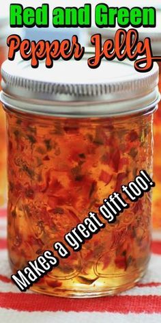 red and green pepper jelly in a glass jar on a striped tablecloth with text overlay