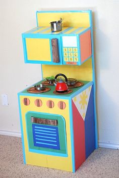 a play kitchen made to look like a toy oven