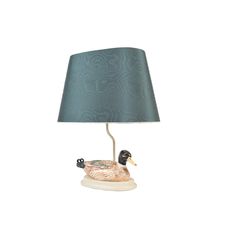 a duck lamp with a blue shade on it