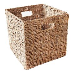 a large woven basket with a white label on the front and bottom, sitting against a white background