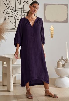 Eco friendly caftans and tunics inspired by the ocean, made on main street. Ethically sourced and locally made in Los Angeles. Deep and rich, our new Eggplant color is the perfect transition hue. Our best selling dress in this seasonless-deep purple color is perfect for fall and winter. Wear with sandals in the summer, pair it with booties in cooler months, this one will be in heavy rotation year around. Made of the most luxe double gauze fabric, this 100% cotton dress is the ultimate wardrobe staple. Flowing and easy, it's as comfortable as it gets. With pockets, of course, and a flattering asymmetric hem and deconstructed trim details, once it's on, we dare you to take it off. Sheerness: none Fabric: 100% Cotton Model height: 5'10"Model wearing size s/m. Care: Machine wash, hang or lay f Aubergine Dress, Aubergine Color, Cotton Gauze Dress, Caftan Tunic, Eggplant Color, Deep Purple Color, Double Gauze Fabric, Gauze Dress, By The Ocean