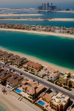 an aerial view of the beach and ocean in abura, united arab emiratesid