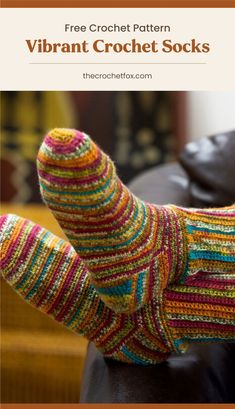 a pair of colorful socks sitting on top of a black leather chair with text overlay that reads free crochet pattern vibrant crochet socks