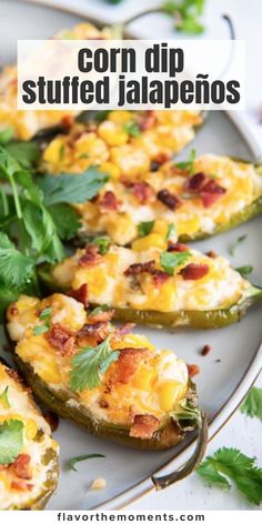 corn dip stuffed jalapenos on a plate