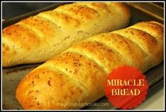 two loaves of bread sitting on top of a baking sheet with the words, miracle bread