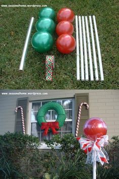 some balloons are laying on the grass and in front of a house with a wreath