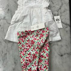 New With Tags Ralph Lauren 2 Piece. Size Is 9 Months. Cute White Flower Top Buttons In Back With Floral Pattern Leggings. Spring Cotton Leggings For Playwear, Cotton Leggings For Playwear In Spring, Cute Cotton Leggings For Spring, Cute Stretch White Sets, Playful White Cotton Leggings, Cute Spring Playwear Leggings, Cute Spring Leggings For Playwear, Ralph Lauren White Fitted Bottoms, Spring Cotton Leggings For Playtime