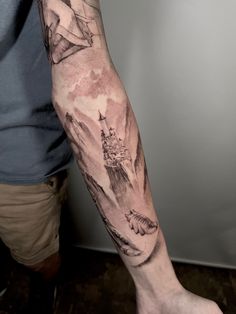 a man with a tattoo on his arm