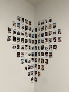 a room with pictures on the wall and a chair in front of it that is upside down