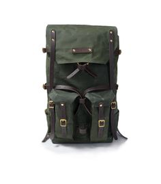 The Freefolk Bushcraft Backpack in Army Green and solid brass hardware. This bag has been handcrafted for adventures or peaceful time in the woods. You can easily fit IN and ON the bag all your gear and supplies needed for weeks in the wilderness. Made of genuine leather, solid brass or stainless steel hardware and quality waxed canvas Freefolk won't let you down. We are waxing canvas ourselves, blending four ingredients to meet the best resistance possible. Beeswax included in the blend comes f Practical Green Backpack For Adventure, Rugged Rectangular Backpack For Outdoor, Rectangular Waxed Leather Backpack For Outdoor, Rugged Outdoor Rectangular Backpack, Rectangular Leather Backpack With Waxed Finish For Outdoor, Standard Khaki Backpack For Camping, Khaki Standard Backpack For Camping, Practical Standard Backpack For Camping, Camping Backpack With Adjustable Strap