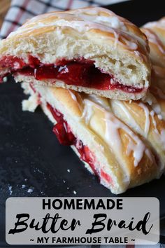 homemade butter and berry braid is cut in half on a black plate with text overlay