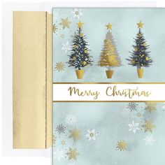 a christmas card with three trees and snowflakes on the front, in gold foil