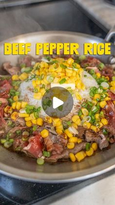 a frying pan filled with beef, corn and rice