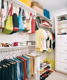 an organized closet with clothes and handbags