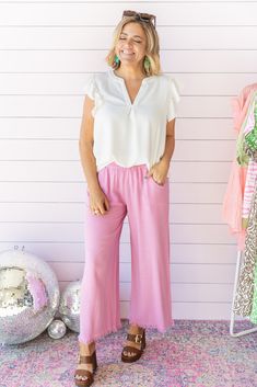 Details: Mauve pink relaxed fit cropped pants Wide legged Elastic waist band Side pockets Frayed hem Fabric: 55% Linen 45% Cotton Hand wash cold Line dry Sizing: Bekah is 5'2, size 4/6, and wearing a size small here. We found these pants ran true to size. Small: 14" (waist) 24" (inseam) 12" (rise) Medium: 15" (waist) 24.5" (inseam) 12.5" (rise) Large: 16" (waist) 25" (inseam) 13" (rise) Mauve Pink, Just Relax, Waist Band, Cropped Pants, Going Out, Elastic Waist, Wide Leg, Size 4, Hand Wash