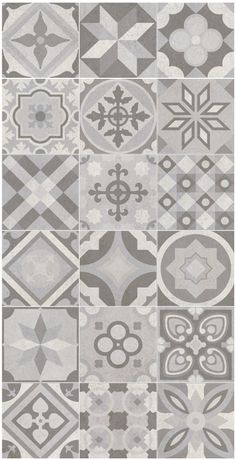 a gray and white rug with many different designs