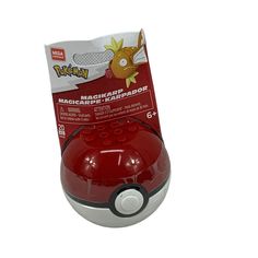 a red and white electronic device with a pikachu on it's back