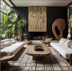 a living room filled with furniture and plants