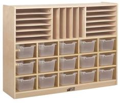 a wooden storage unit with twelve bins and dividers