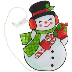 a snowman with headphones and a green scarf holding a candy cane in it's hand