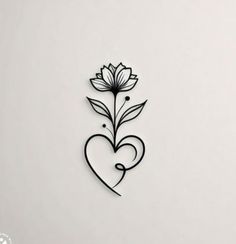 a drawing of a heart and flower on a white background with the word love written in it