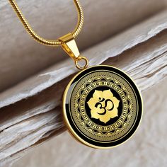 "This Om Lotus Mandala Necklace Is the Perfect Gift for all those yoga lovers, Whether for Yourself or a Loved One.  ➜ Our jewelry is made of high-quality surgical steel with a shatterproof liquid glass coating and an 18k gold finish option. ➜ Engrave onto the back of the Om Lotus Mandala pendant your loved one's name, your wedding date, an anniversary, or anything else you want to remember and keep you close to her heart. You can add 2 lines and each up to 20 characters long. Each personalized Om Gold Pendant For Men, Om Pendant For Men, Earrings With Price, Pendant Jewelry Gold, Om Earrings, Om Mandala, Ohm Pendant, Indian Gold Necklace Designs