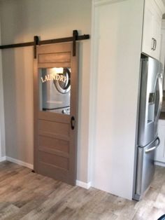 an open door leading to a laundry room