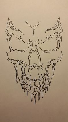 a drawing of a skull with lots of teeth