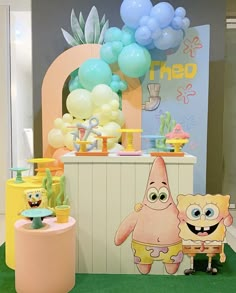 there are balloons and decorations on display at this birthday party with spongebob characters