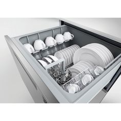 an open dishwasher drawer with dishes in it