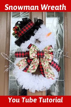 a snowman wreath on the front door with words below it that reads, you tube tutor