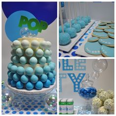 blue and white desserts are displayed on the table at a birthday party or baby shower