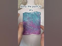 someone is holding up a piece of paper with the words, allow the paint to dry