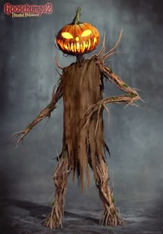 a creepy looking tree stump with a jack o lantern on it's head