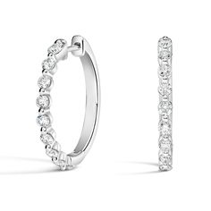 Luxe Marseille Diamond Hoop Ears - 18K White Gold. Stunning yet effortless, these beautiful hoop earrings feature glistening round diamonds in sophisticated shared prong settings (5/8 total carat weight). Oval Diamond Hoop Earrings With Prong Setting, Diamond White Classic Hoop Earrings, Timeless White Gold Hoop Earrings With Brilliant Cut, Timeless Brilliant Cut White Gold Hoop Earrings, Fine Jewelry Round Hoop Earrings With Prong Setting, Elegant Hoop Earrings With Brilliant Cut, Fine Jewelry Hoop Earrings With Prong Setting, Classic Hoop Earrings With Single Cut Diamonds, Formal Round Hoop Earrings With Prong Setting