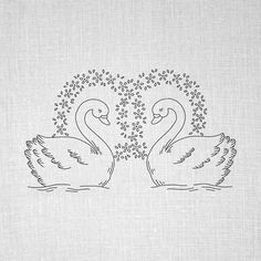 two swans in the water with bubbles coming out of their beaks on a linen background