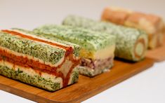 three different types of food on a wooden tray