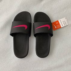 New With Tags Nike Slippers. Black Pink And White. Slippers Nike, Trendy Black Slide Slippers, Nike Slippers Women, Nike Casual Pink Sandals, Black Nike Slides, Nike Sporty Pink Sandals, Sporty Pink Nike Sandals, Pink Black And White Nike Slides, Nike Slides Comfortable Non-slip