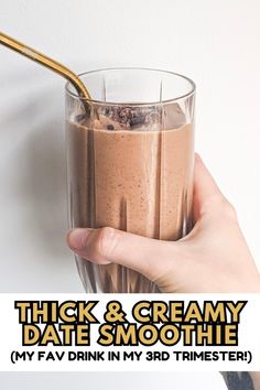 a hand holding a glass with chocolate milk and ice cream in it that says thick & creamy date smoothie my fav drink is 3rd trimester