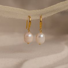 Dangling Pearl Drop Gemstone Earrings Pearl Earrings For Bridesmaids, Dainty Pearl White Earrings For Pierced Ears, Elegant Pearl White Everyday Earrings, Graceful Pearl White Earrings, Elegant Everyday Pearl White Earrings, Elegant Everyday Pearl White Pearl Earrings, Graceful Pearl White Pearl Earrings, Elegant Earrings With Pearl Charm For Everyday, Elegant Everyday Earrings With Pearl Charm