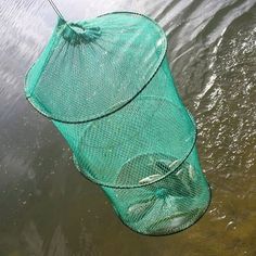 a fishing net floating on top of a body of water