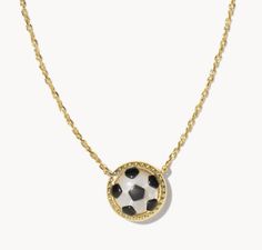 Score major style points when you wear the Soccer Gold Short Pendant Necklace in Ivory Mother-of-Pearl. A shimmering soccer ball pendant complete with gunmetal detailing, this sporty style brings the spirit to every game. Metal 14k Yellow Gold Over Brass Closure Lobster Clasp W/ Single Adjustable Slider Bead Size 19"Chain, 0.51"L X 0.49"W Pendant Soccer Ball Necklace, Patch Tshirt, Soccer Necklace, Christmas Wants, Short Pendant Necklace, Safari Hat, Unique Gift Items, Gold Shorts, Kendra Scott Necklace